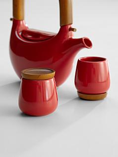 ceramic teacups + wooden saucer