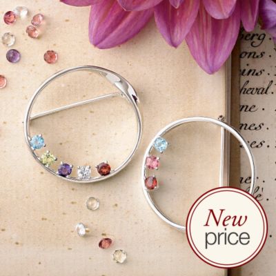 silver mother's embrace brooch